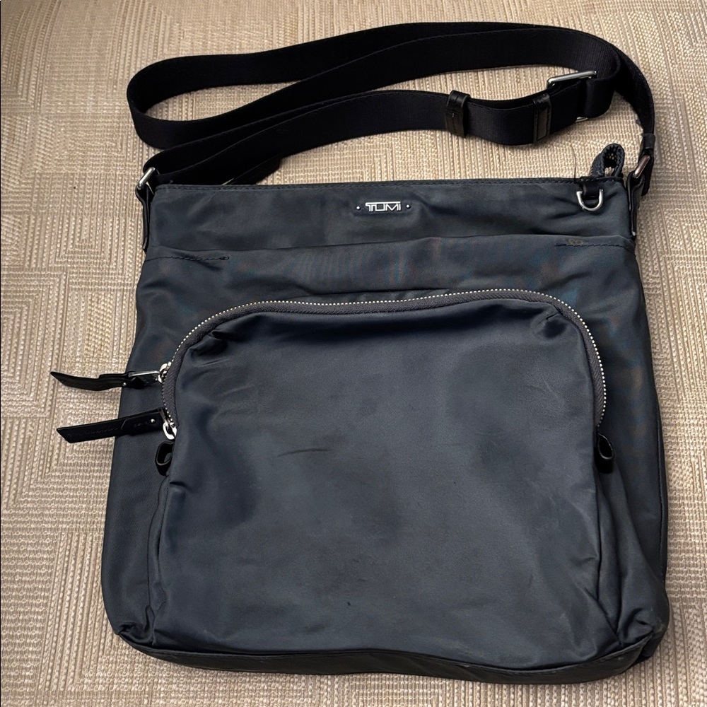 Tumi Voyageur multi pocket bag- olive green with a brown strap: 10 x10 inches